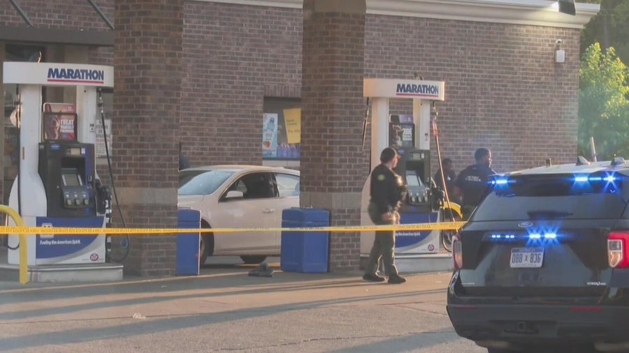 Person of interest in custody after two dead in quadruple shooting at ...