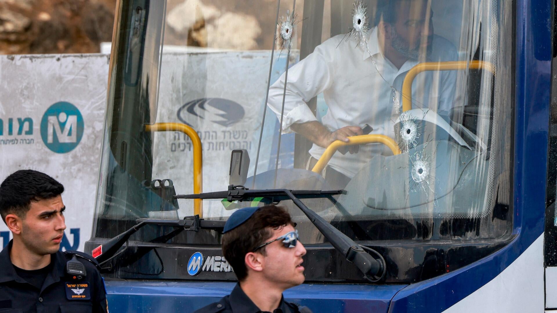 Palestinian gunmen kill 6 people in attack at Jerusalem bus stop - CBS News