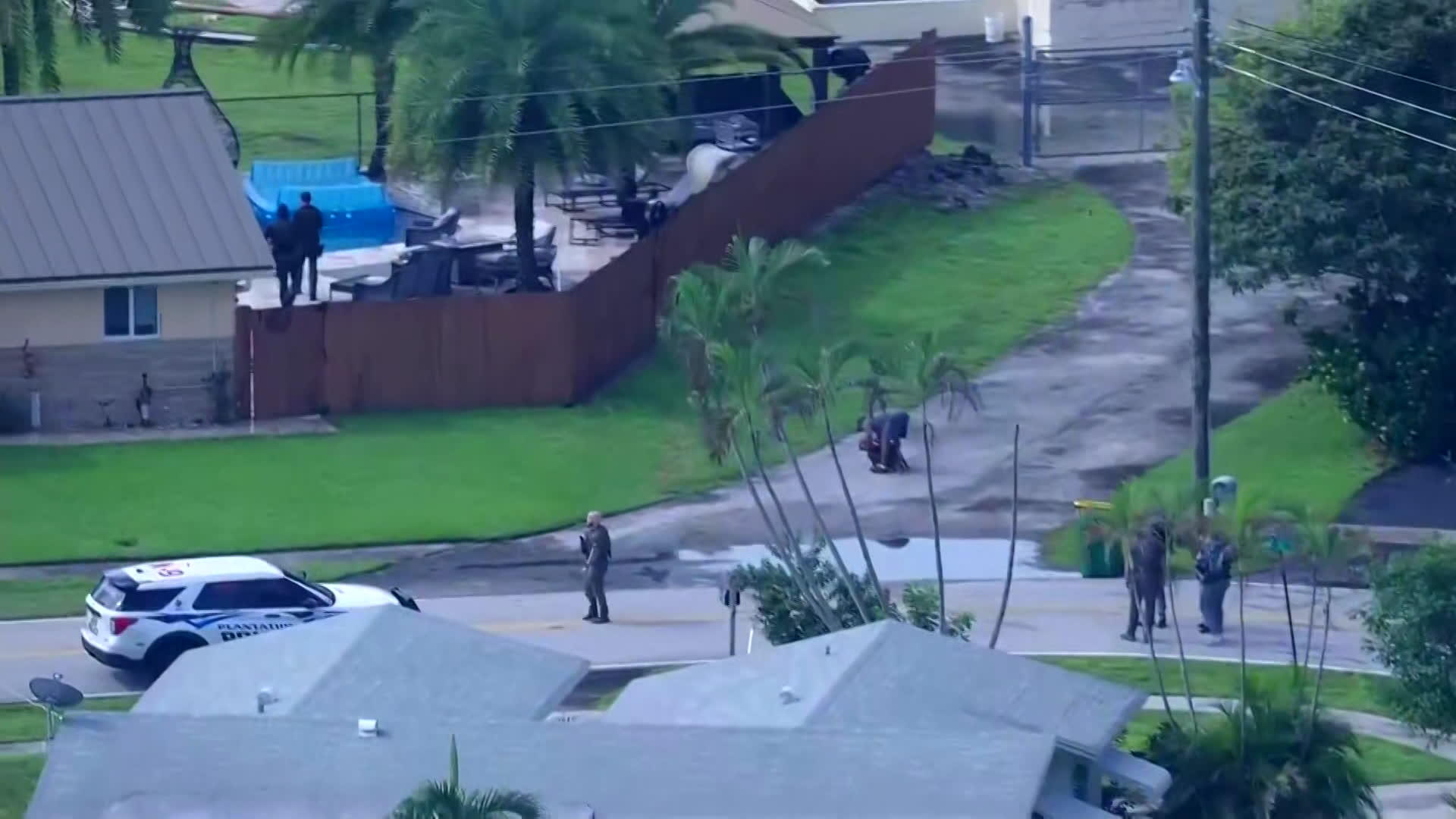 Man arrested after jumping into canal, injuring trooper in Plantation ...