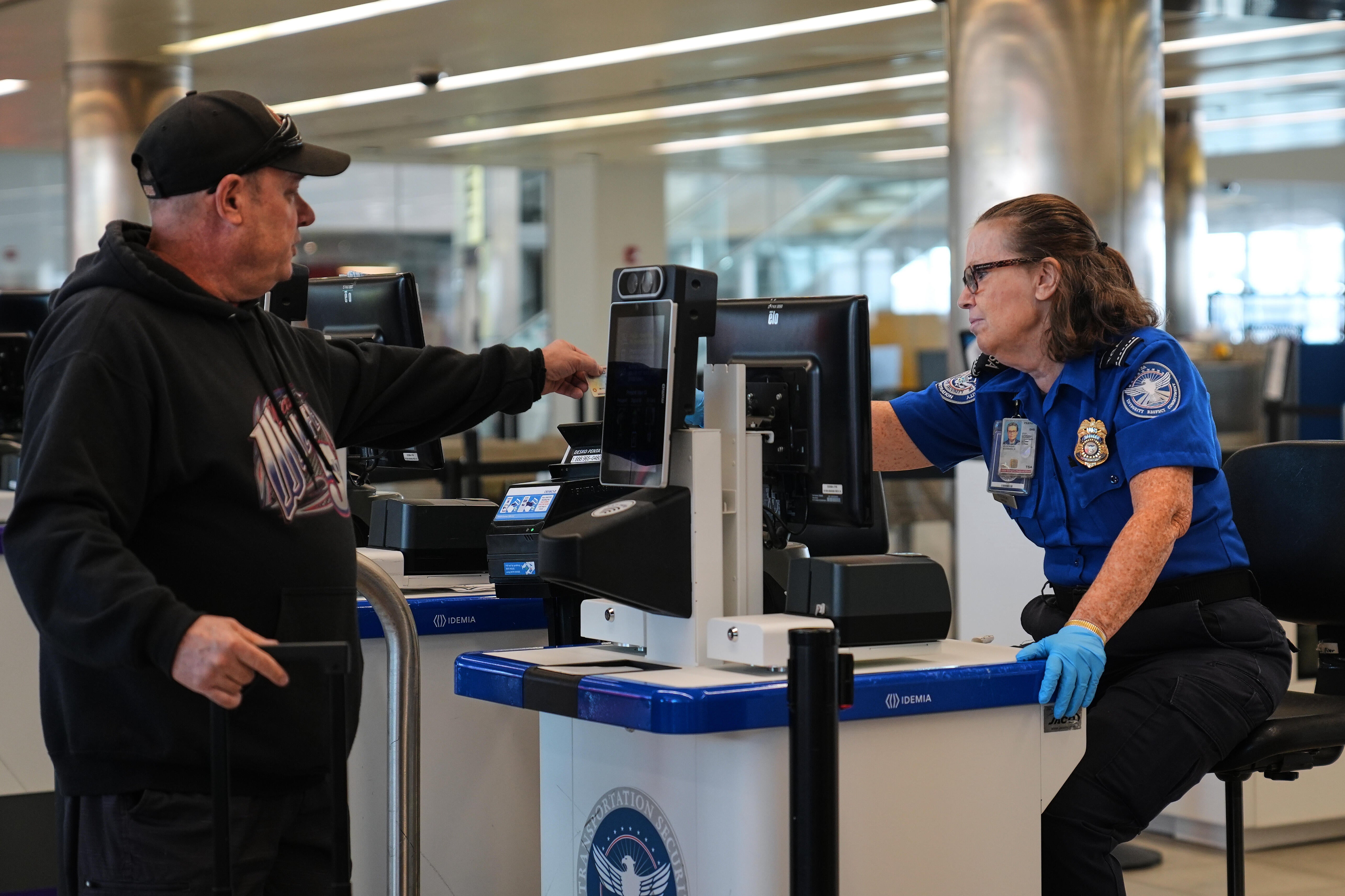 TSA officers working at airport security checkpoint during government shutdown