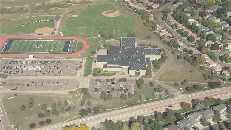Man arrested after accidentally shooting door of Colorado middle school
