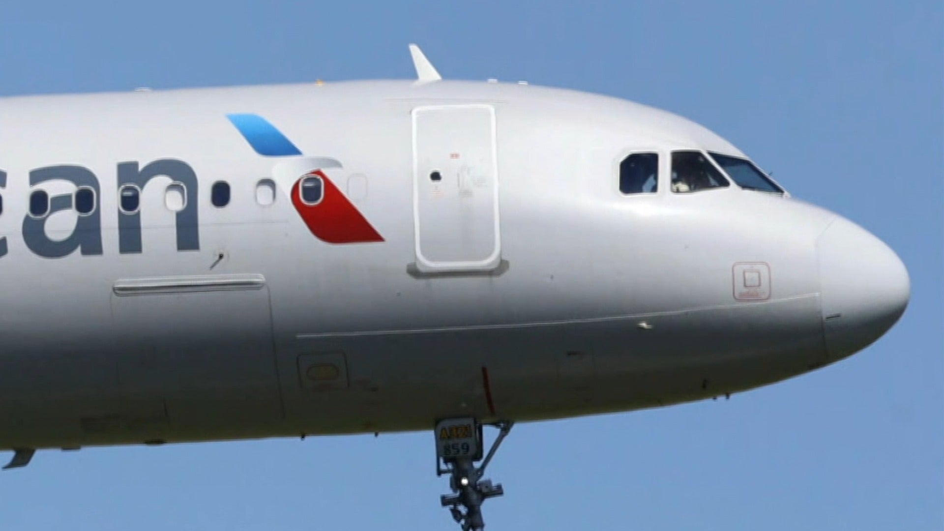 Pilot reports possible burn injuries after passenger's laptop catches fire