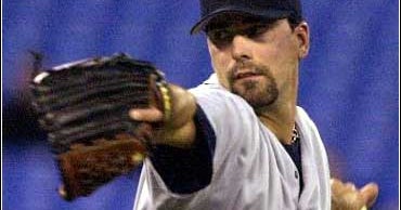 Martinez, Mariners Slam Jays CBS News