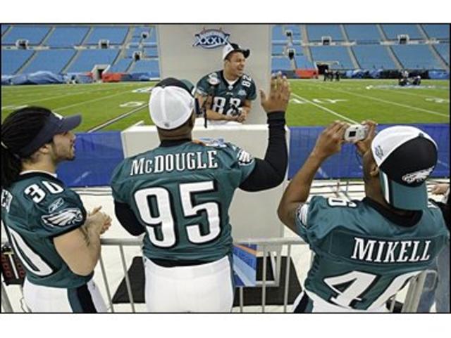 The Philadelphia Eagles' Terrell Owens tests his ankle during Media Day for  Super Bowl XXXIX on Feb. 1, 2005, in Jacksonville, Fla. The Eagles will  play the New England Patriots for the