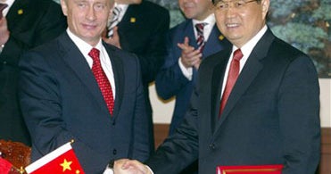 Russia, China Pledge Closer Ties - CBS News
