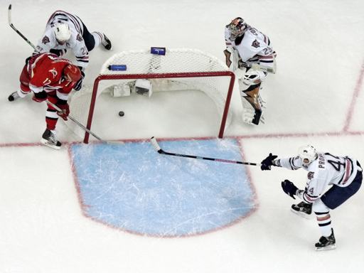 Hurricanes' Rod Brind'Amour (17) scores the winning goal 
