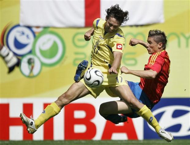 Spain forward Fernando Torres, right, and the Ukraine's Vladyslav Vashchuk 