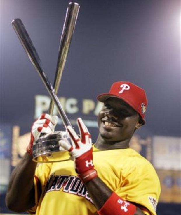 Philadelphia Phillies Ryan Howard holds his trophy after he won the baseball All Star Game home run derby 