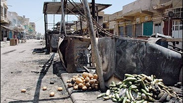 destroyed market remains empty after being raided by armed gunmen 