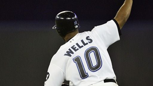 Vernon Wells (10) of the Toronto Blue Jays celebrates his game-winning solo home run for a 5-4 win over the New York Yankees 