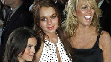Lindsay Lohan with mom Dina and sister Aliana 
