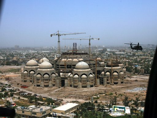 A U.S. helicopter flies past an unfinished Shiite Mosque, started to be built by Former Iraqi President Saddam Hussein 