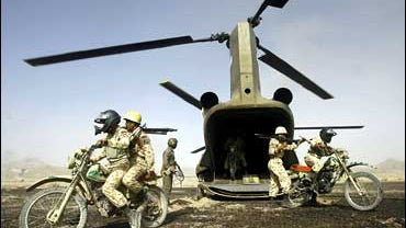 Iranian military forces alight from a helicopter during a training exercise in Zahedan, in the southeastern province of Sistan va Baluchistan, Iran, on Saturday Aug. 19, 2006. 
