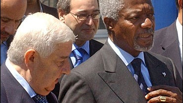 UN Secretary General Kofi Annan and Syrian Foreign Minister Walid Moallem 