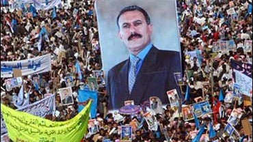 Supporters of Yemeni President Ali Abdullah Saleh attend a pre-election campaign rally in a small stadium in Ibb, Yemen. 