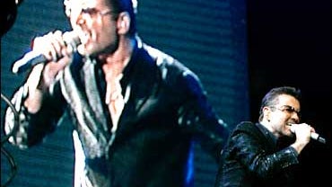 Singer George Michael performs his first concert during his 'Live 25' European tour at the Palau Sant Jordi in Barcelona, Spain. 