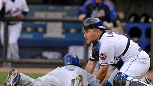 New York Mets catcher Paul Lo Duca, right, tags out Los Angeles Dodgers J.D. Drew at home plate in the second inning 