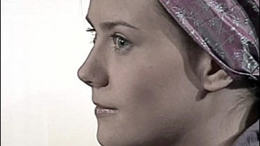 A video-screen image shows Austrian kidnap-hostage Natascha Kampusch during her first interview, 