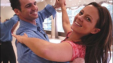 Tony Dovolani and Country Music singer Sara Evans strike a pose 