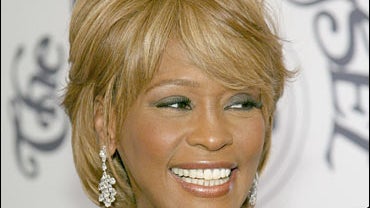 Whitney Houston arrives at the 17th Annual Mercedes-Benz Carousel 