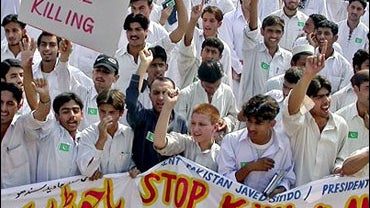 Pakistani students chant anti government slogans during a protest rally to condemn bombing in Pakistani tribal area 