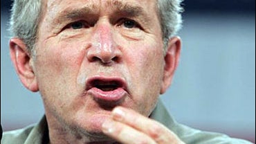 President Bush gestures during a rally for the Republican party at the Georgia National Fairgrounds in Perry, Ga. 