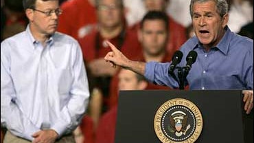 President Bush encourages the crowd to vote for Sen. Jim Talent, R-Mo., left, during a rally in Springfield, Mo. Friday, Nov. 3, 2006. 
