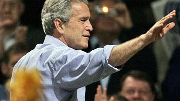 President Bush waves as he leaves a Kansas Victory Rally at the Kansas Expocentre in Topeka 