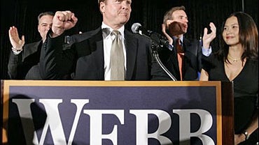 Senate candidate Jim Webb, center, pumps his fist as he is joined by Gov. Tim Kaine, D-Va., left, and former Gov. Mark Warner, D-Va., right, during election night in Vienna, Va. 
