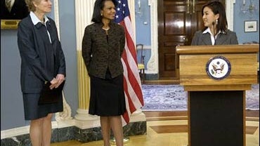 Figure skater Michelle Kwan, at the State Department in Washington, Nov. 9, 2006, accepting a position as a non-salaried diplomat for the U.S. 