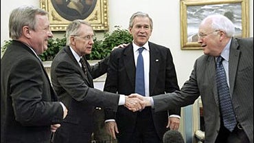 President Bush, center, watches as Democratic Senate leader Sen. Harry Reid, D-Nev., second from left, shakes hands with Vice President Dick Cheney, right, as Sen. Richard Durbin, D-Ill., left, looks on, following their meeting in the Oval Office 