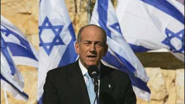 Israeli Prime Minister Ehud Olmert speaks at the grave of Israel's first Prime Minister David Ben Gurion 