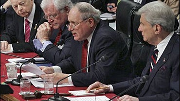 Sen. Carl Levin, D-Mich. ranking Democrat of the Senate Armed Services Committee, second from right, questions Defense Secretary-designate Robert Gates during the committee's confirmation hearing on Capitol Hill in Washington, Tuesday, Dec. 5, 2006. 
