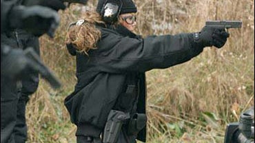 LaToya Jackson takes aim during filming of the CBS reality 