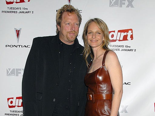 Matthew Carnahan (left) and actress Helen Hunt  arrives at the premiere of the 