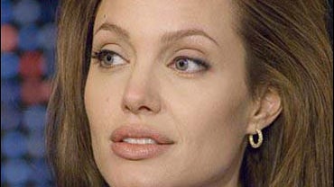 Larry King, interviews Angelina Jolie 