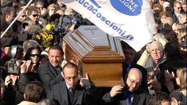 Welby's coffin at funeral 