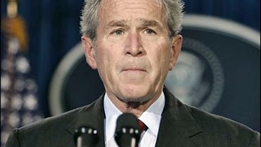 President Bush pauses while making a statement on Wednesday, Dec. 27, 2006 in Crawford, Texas about the death of former President Gerald Ford. 