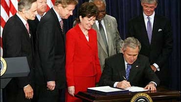 President George W. Bush signs the Postal Accountability and Enhancement Act 