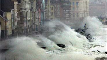 Huge waves pound the port of Wimereux in northern France. The British Isles and Germany were battered Thursday by a severe storm front packing gale-force winds, with forecasters predicting worse to come. 