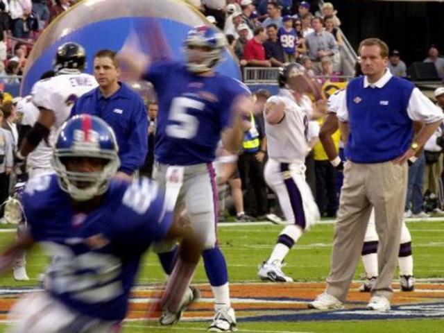 Baltimore Ravens Chris McAlister, left, and Duane Starks (22) celebrate  Starks' interception return for a touchdown against the New York Giants  during the third quarter in Super Bowl XXXV Sunday, Jan. 28