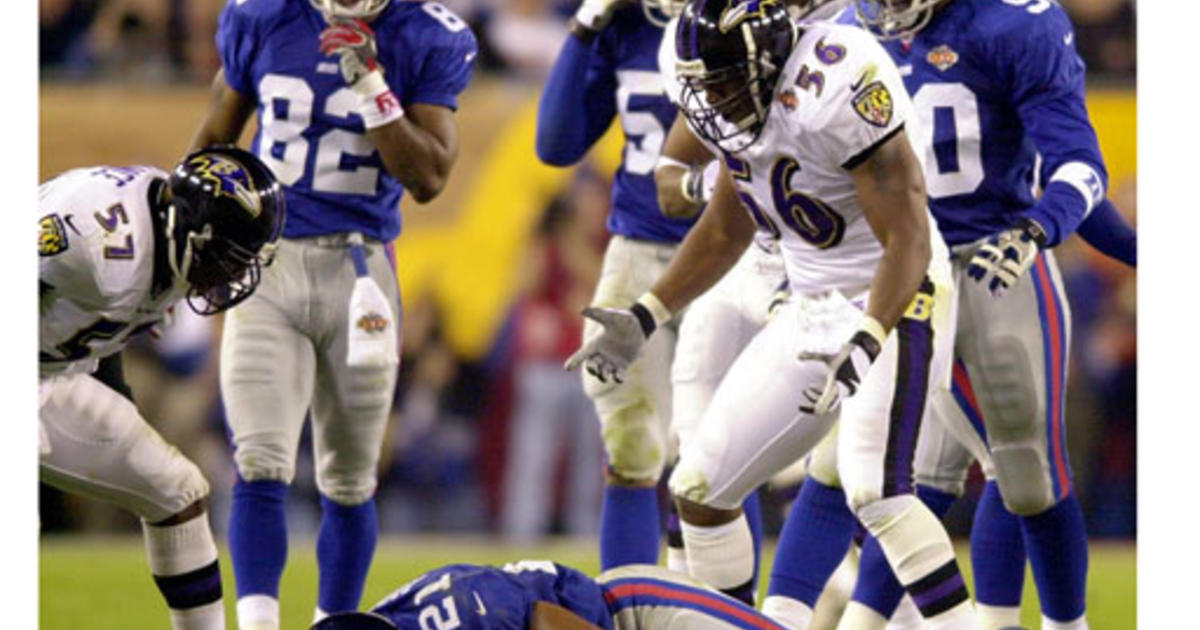 Baltimore Ravens Chris McAlister, left, and Duane Starks (22) celebrate  Starks' interception return for a touchdown against the New York Giants  during the third quarter in Super Bowl XXXV Sunday, Jan. 28