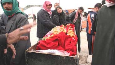 Sadriyah market bombing, baghdad, funeral, coffin 