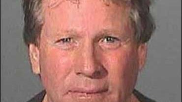 Oscar-nominated actor Ryan O'Neal is shown in his booking photo after he was arrested for assaulting his son, Griffin O'Neal, early Saturday, Feb. 3, 2007. O'Neal, 65, was arrested and accused of assault with a deadly weapon and negligent discharge of a f 
