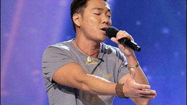 Paul Kim from Saratoga, Calif. performs in front of the judges on Fox's "American Idol," 