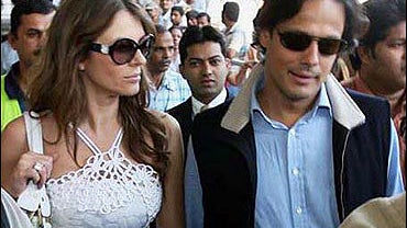 Elizabeth Hurley, left, and her husband 