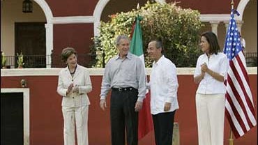 President Bush, first lady Laura Bush, Mexican President Felipe Calderon his wife Magarita Zavala, right, in Temozon Sur, Mexico, Tuesday, March 13, 2007. 