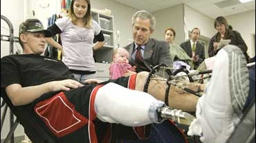 Presdient George W. Bush, Walter Reed hospital, prosthetic, wounded soldiers, 