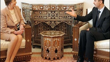  on Wednesday, April 4, 2007 with U.S. House speaker Nancy Pelosi at Ash-Shaeb presidential palace in Damascus. 