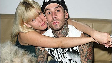 Musician Travis Barker (L) and Shanna Moakler 